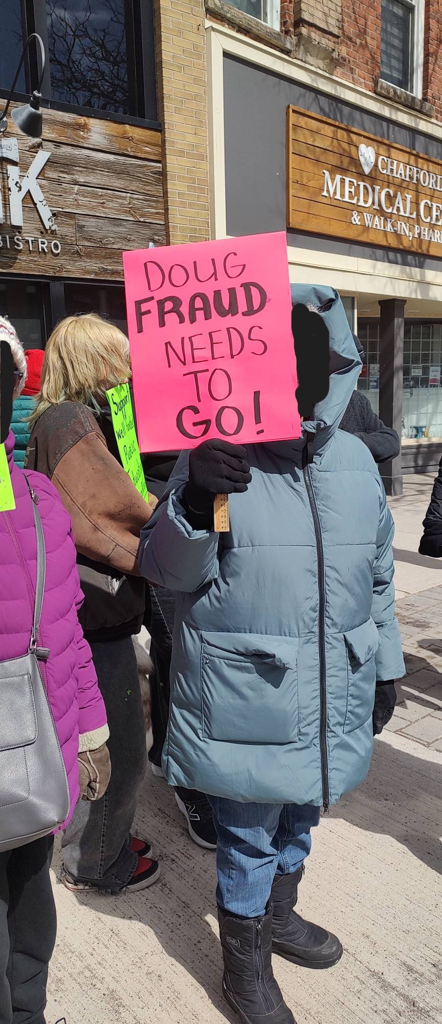 protest poster "doug fraud needs to go!"