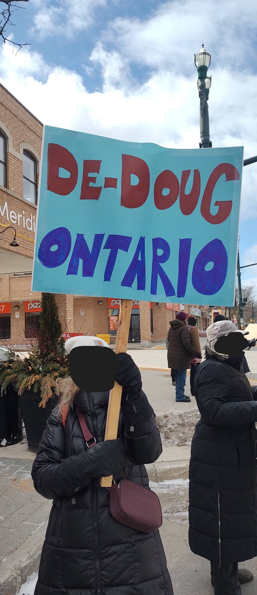Protester poster "de-doug ontario"